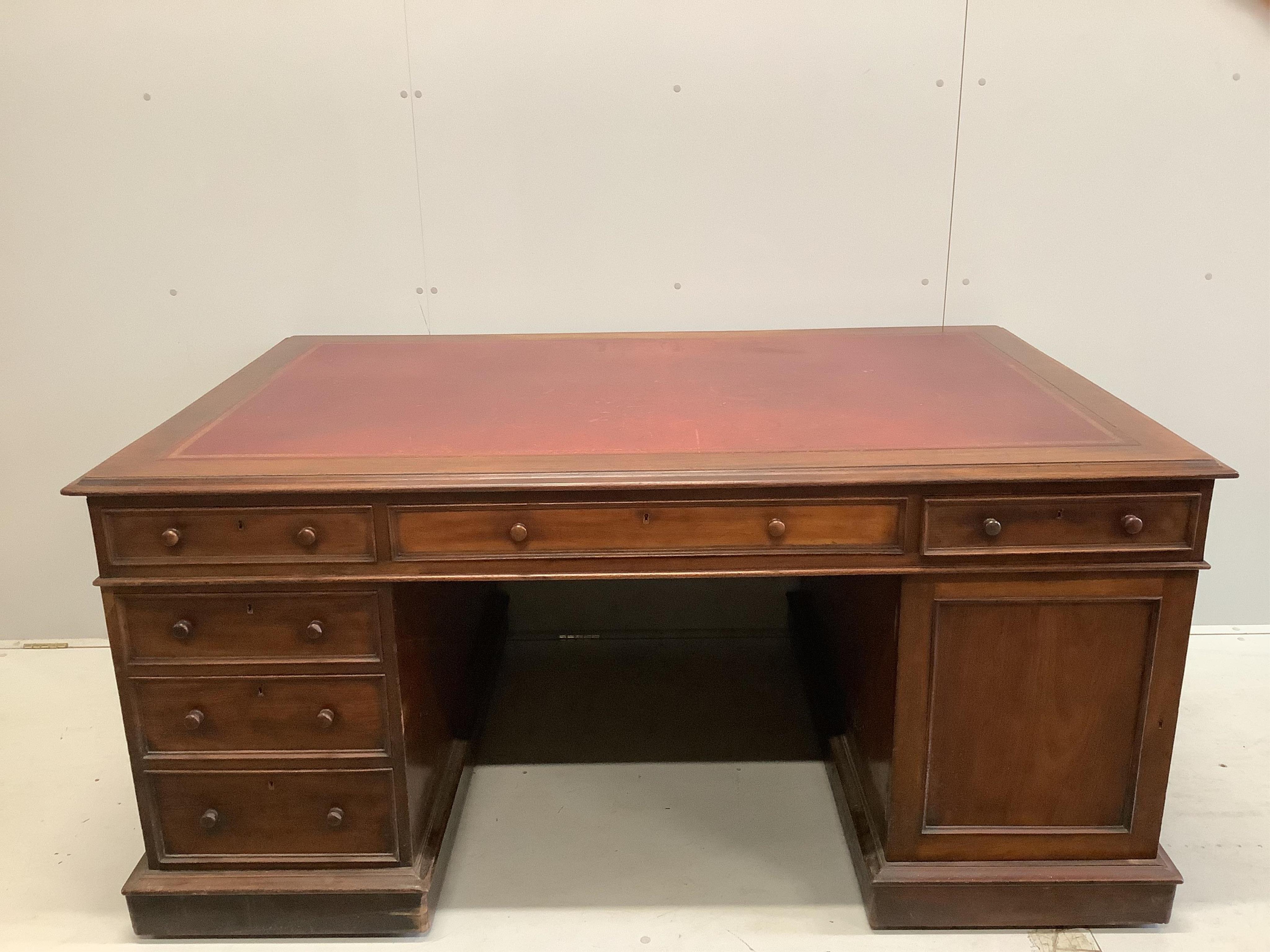 A Victorian mahogany pedestal partner's desk, width 168cm, depth 110cm, height 80cm. Condition - fair